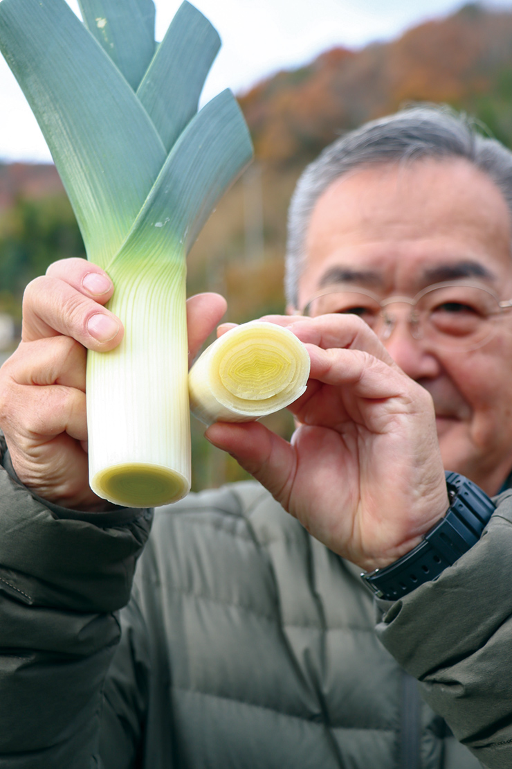 「家庭でも『満点リーキ』を食べて縁起をかついで春を迎えてほしい」と話す髙見部会長の写真